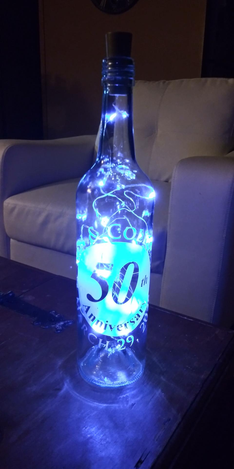 lighted etched wine bottle