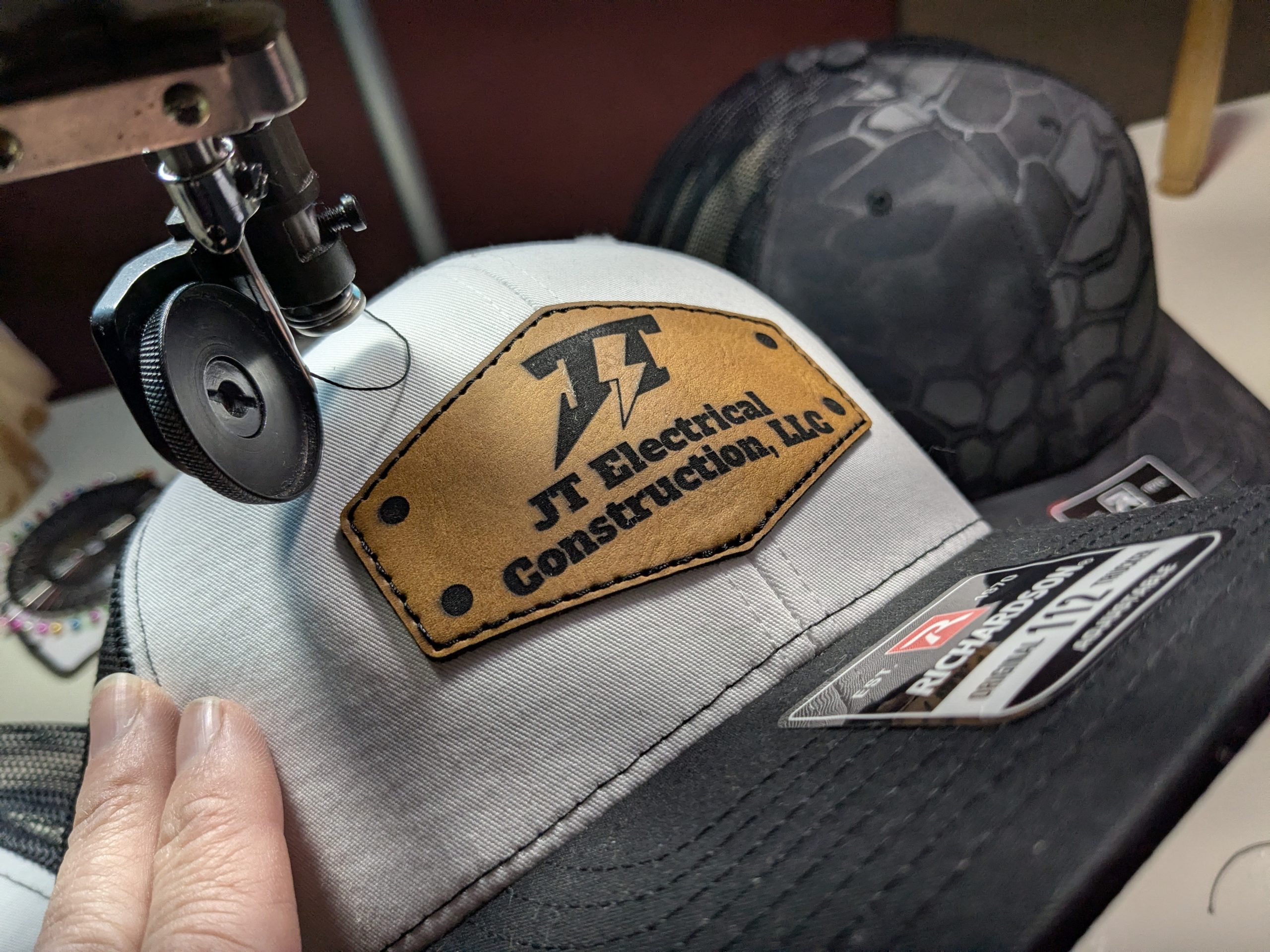 JT Electrical Construction laser engraved richardson 112 sewed on for extra value